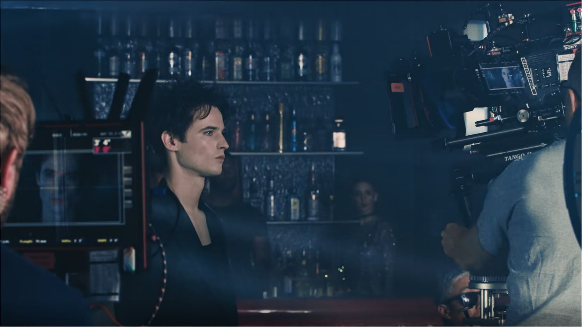 Behind the scenes of The Sandman season 2 as Tom Sturridge films a bar scene, with camera rigs and monitors visible on set.(Image via Netflix)